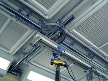 Overhead Monorail System with shifting bridge in a painting plant with pneumatic swivels